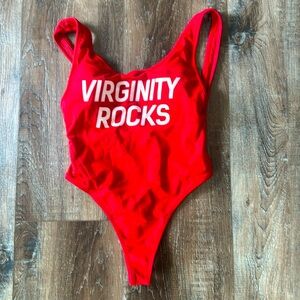 One piece virginity rocks small bathing suit. only worn a handful of times.